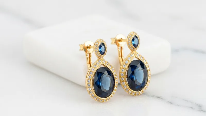 Boucles d'oreilles pendantes saphir rose en or blanc